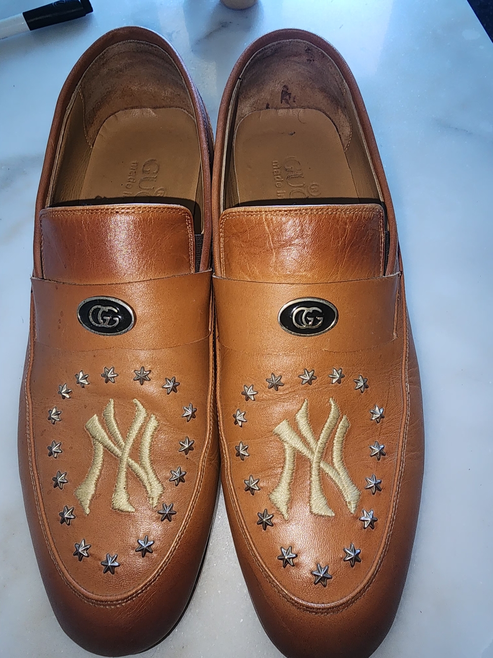 Gucci Men’s Tan Leather Loafers with Embroidered Logo